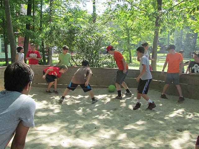 Hiram House campers playing soccer
